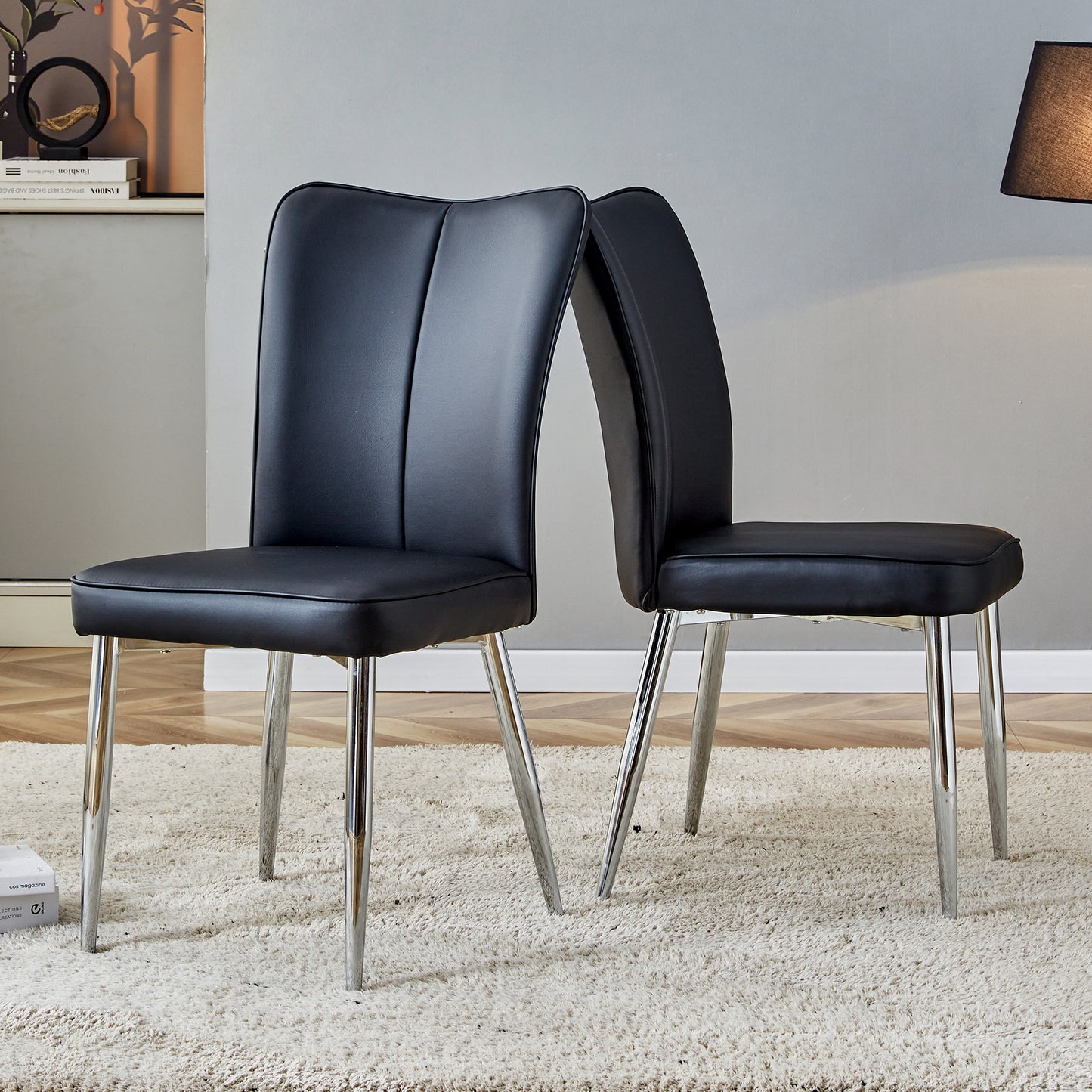 Modern minimalist dining chairs black PU leather curved backrest and cushion black metal semi matte chair legs